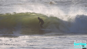 surfing california novelty barreling sandbar during winter storm